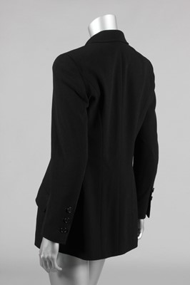 Lot 192 - A Chanel boutique black jacket, 1990s,...