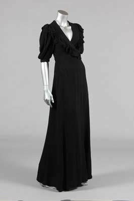 Lot 196 - An Ossie Clark black moss crepe dress, mid...