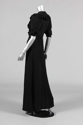 Lot 196 - An Ossie Clark black moss crepe dress, mid...