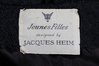Lot 200 - A Jacques Heim black boucle wool dinner dress,...
