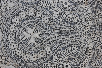 Lot 405 - An ivory silk Maltese bobbin lace shawl, late...
