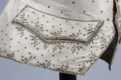 Lot 207 - An embroidered sleeved waistcoat, circa 1770,...
