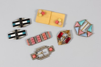 Lot 211 - A large group of embroidered motifs, hat bands,...