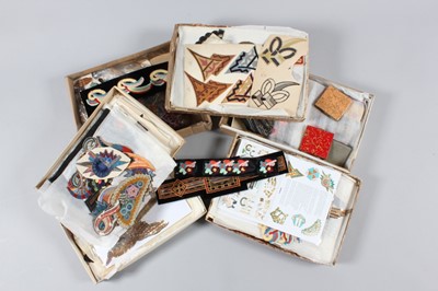 Lot 211 - A large group of embroidered motifs, hat bands,...