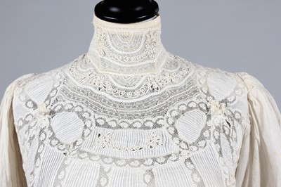 Lot 215 - A Valenciennes lace inset summer gown, circa...