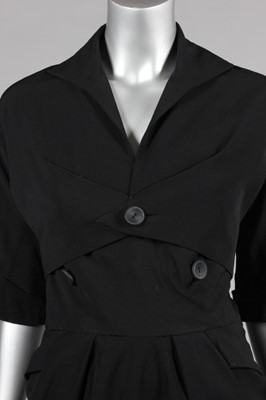 Lot 218 - A Dior-style black wool dinner dress, early...
