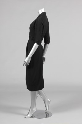 Lot 218 - A Dior-style black wool dinner dress, early...