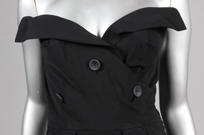 Lot 218 - A Dior-style black wool dinner dress, early...