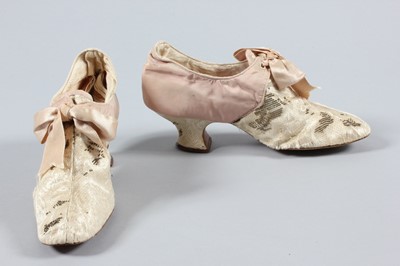 Lot 219 - A Madame Doucet Brussels lace and pink...