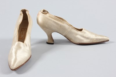 Lot 219 - A Madame Doucet Brussels lace and pink...