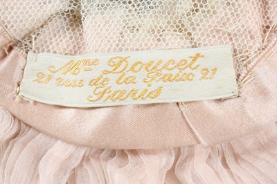 Lot 219 - A Madame Doucet Brussels lace and pink...