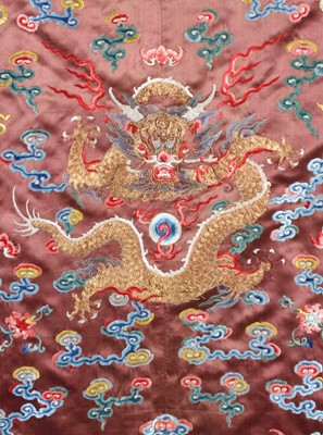 Lot 258 - An embroidered brown satin dragon robe, jifu,...