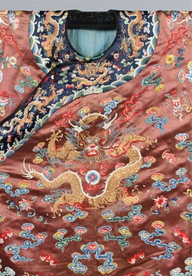 Lot 258 - An embroidered brown satin dragon robe, jifu,...