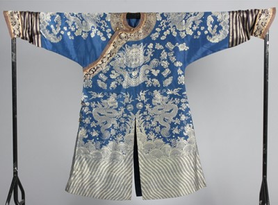 Lot 265 - A brocaded silk dragon robe, jifu, circa 1900,...