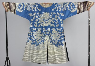 Lot 265 - A brocaded silk dragon robe, jifu, circa 1900,...