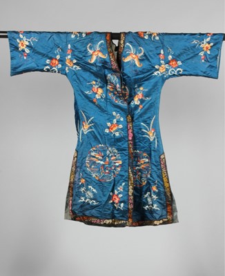 Lot 270 - An embroidered blue satin informal lady's robe,...