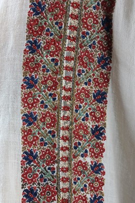 Lot 283 - A fine embroidered chemise or kolonato,...