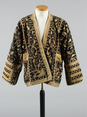 Lot 288 - A lavishly embroidered black wool jacket,...