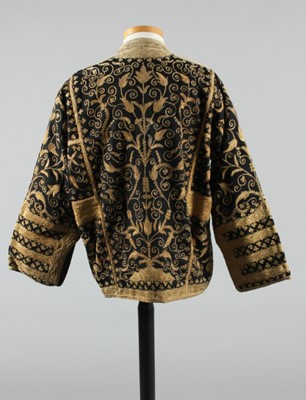 Lot 288 - A lavishly embroidered black wool jacket,...