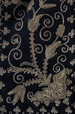 Lot 288 - A lavishly embroidered black wool jacket,...