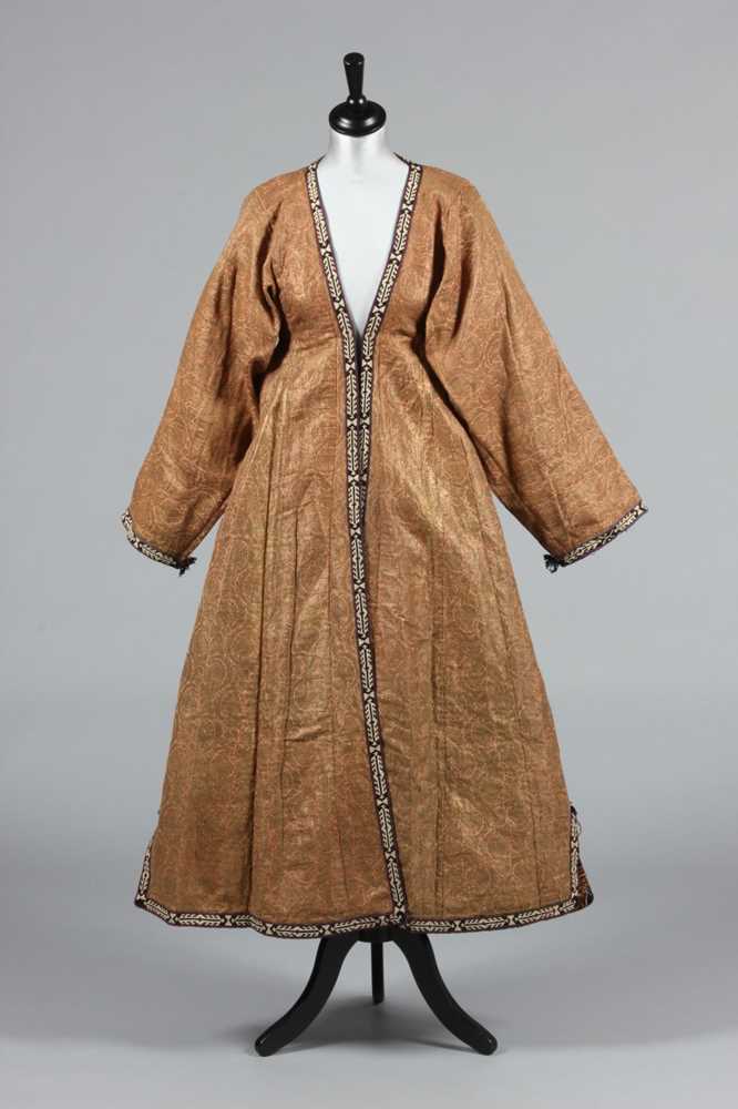 Persian Robe Lot 328 - A woman's chapan robe of gold and pink