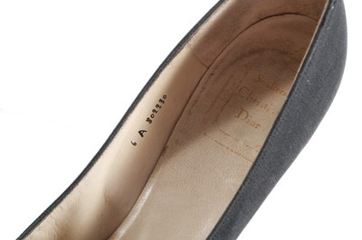 Lot 153 - A pair of Christian Dior black silk shoes,...