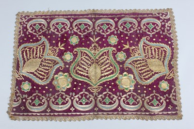 Lot 339 - An embroidered magenta velvet panel, Bukharan,...