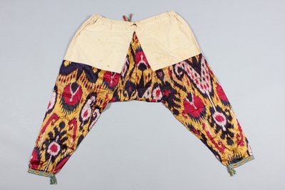 Lot 343 - Three pairs of ikat satin lady's trousers,...