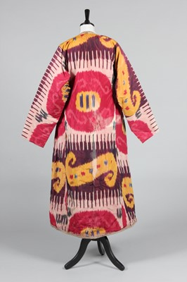 Lot 346 - A woman's ikat silk chapan, Uzbek, early 20th...