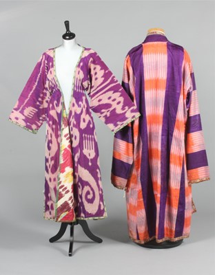 Lot 348 - A woman's purple and white ikat silk chapan,...