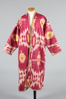 Lot 351 - A woven cotton/silk ikat padded khalat or coat,...