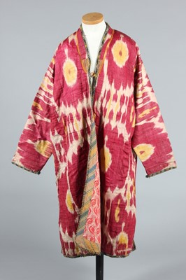 Lot 352 - A woven cotton/silk ikat padded khalat or coat,...