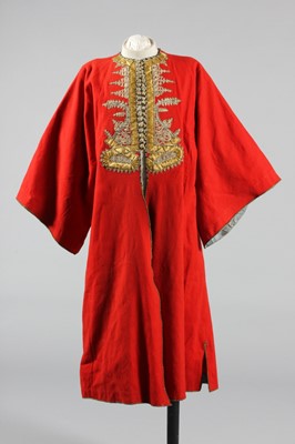 Lot 282 - A scarlet felted wool man's robe, Moroccan,...