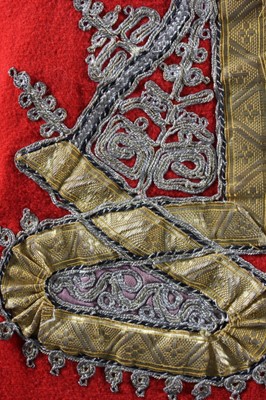 Lot 282 - A scarlet felted wool man's robe, Moroccan,...