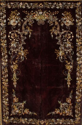 Lot 376 - An embroidered plum velvet prayer arch,...