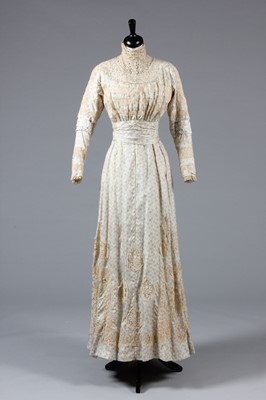 Lot 3 - A blue figured cotton summer gown, circa 1900,...