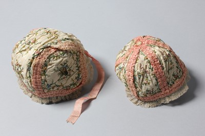 Lot 151 - Two silk baby bonnets, French, late 18th...