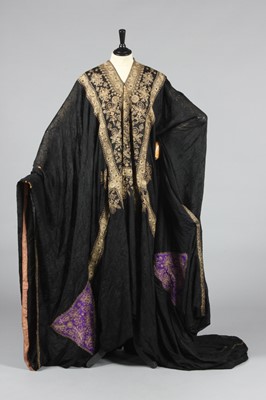 Lot 366 - An embroidered black silk gauze abayah,...