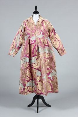 Lot 359 - A dress of lavish Russian brocade, the fabric...