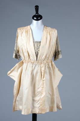 Lot 8 - A printed and beaded ivory chiffon dress,...