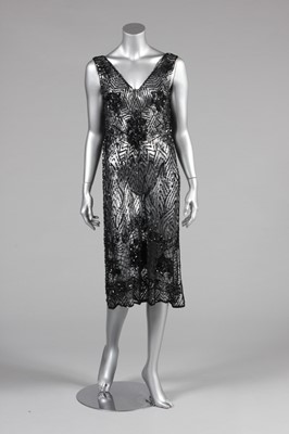 Lot 14 - A black sequined tabard circa 1918-20, the...