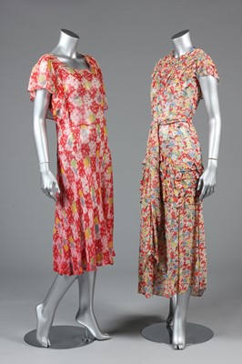 Lot 21 - Two floral printed chiffon dresses, early...