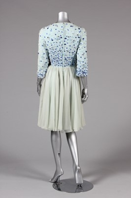 Lot 41 - A pale blue chiffon couture cocktail dress,...