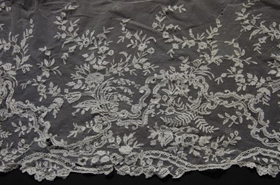 Lot 397 - A Honiton bobbin applique dress flounce, circa...