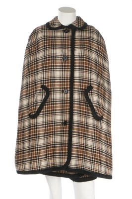 Lot 162 - A Christian Dior plaid cape and mini-skirt,...