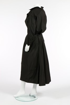 Lot 106 - A Charles James for Samuel Winston black silk...