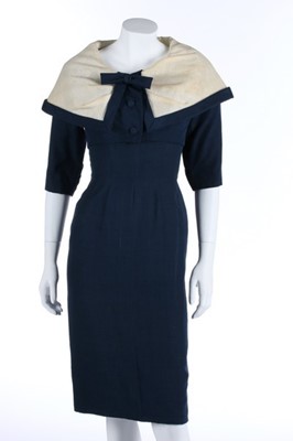 Lot 104 - A Jacques Fath couture navy shantung afternoon...