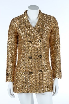 Lot 158 - A Chanel couture gold lurex-weave jacket, 1969,...