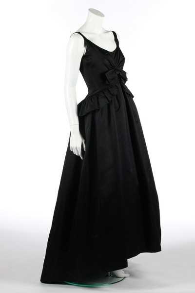 Lot 147 - A Nina Ricci black silk ball gown, circa 1960,...