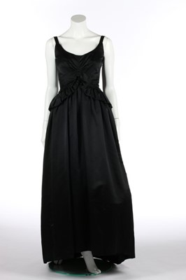 Lot 147 - A Nina Ricci black silk ball gown, circa 1960,...